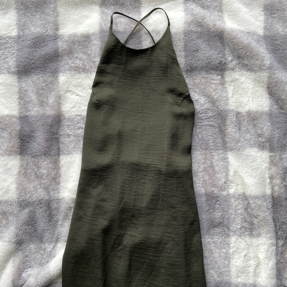 Emerald green satin slip dress. Cris cross detail in back. Zip on side